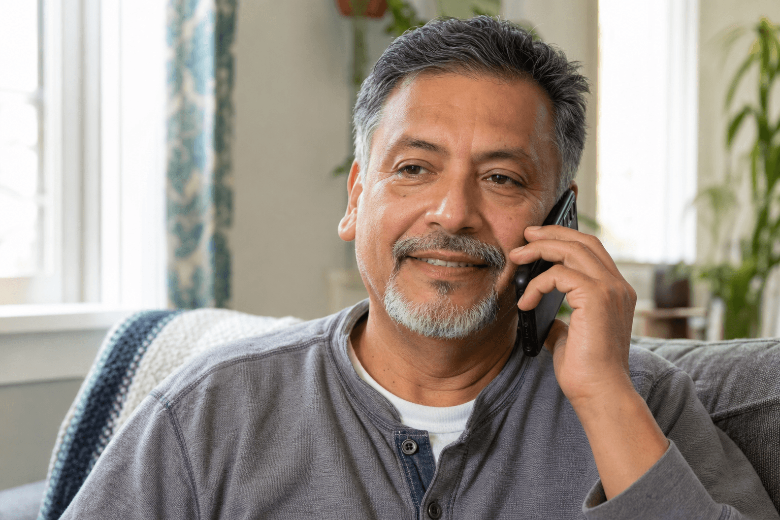 Patient receiving a post-discharge follow-up call at home